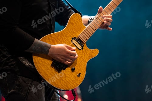 Preview: Rock and roll group performing live.
