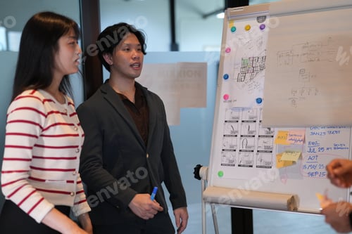 Preview: Team of young professionals discussing business ideas