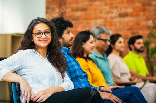 Preview: Indian Young business professionals gathering for corporate training session in professional office