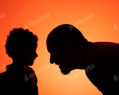 Preview: Silhouette of a father smiling with his young son