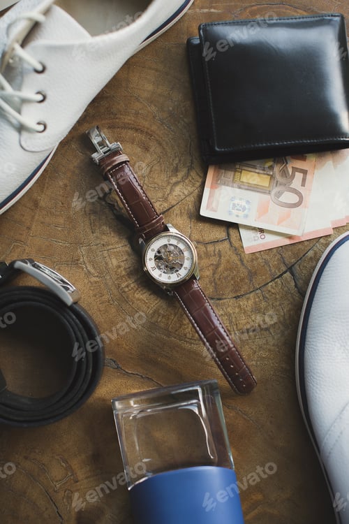 Preview: Accessories for men on a wooden table