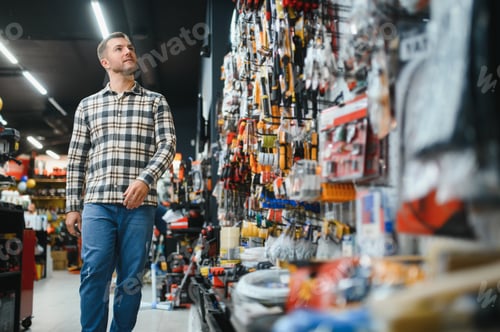 Preview: A male buyer in a modern hardware store.