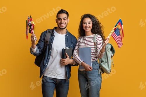 Preview: Education Abroad. Young Arab Man And Woman Holding Stack Of International Flags