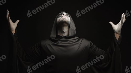 Preview: Young man dressed up as angel of darkness