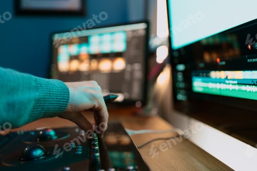 Preview: Male hand Video Editor Working on His Personal Computer with Big Display