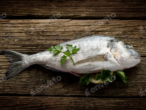 Preview: gilthead over wood ready to cooking