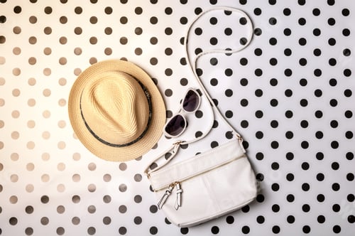 Preview: Hat, Sunglasses, and Bag on Polka Dot Background