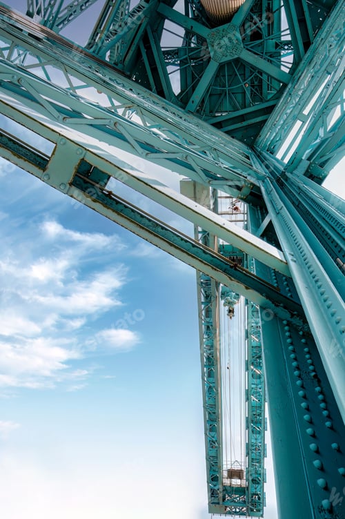 Preview: Close up of Titan Crane stands tall overlooking a tranquil lake in Scotland