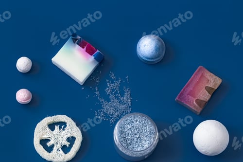 Preview: different body care items on blue color.
