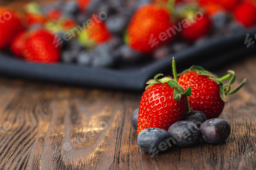 Preview: Close up photo of blueberries and strawberries