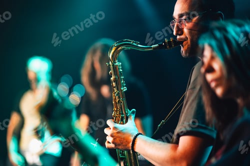 Preview: Saxophonist performing live with band on stage