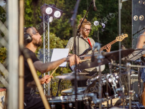 Preview: Music band having concert rehearsal on the street