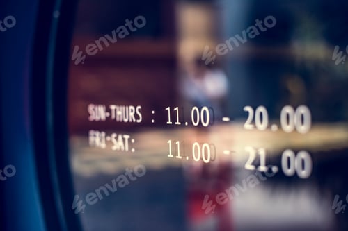 Preview: Business hours announcement on a window