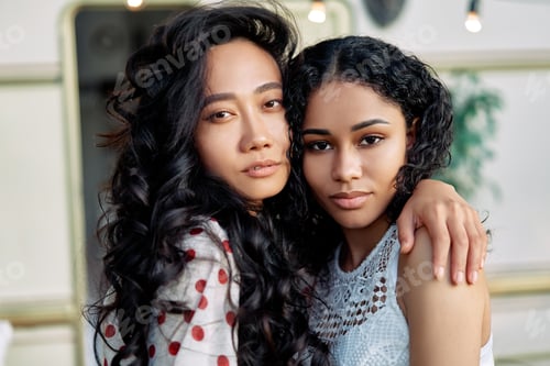 Preview: Two best friends embracing outdoors. Women friendship concept