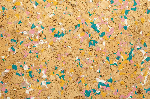 Preview: Close-up of cork sound insulation lagging with interspersing of blue paint floors and walls