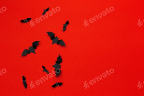 Preview: halloween and decoration concept - paper bats flying
