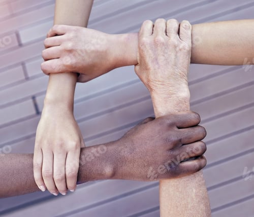Preview: Cropped shot of a group of unrecognizable businesspeople linking arms