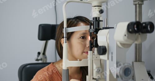 Preview: Woman check on eye in clinic