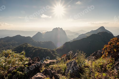 Preview: Sunshine over mountain range in wildlife sanctuary