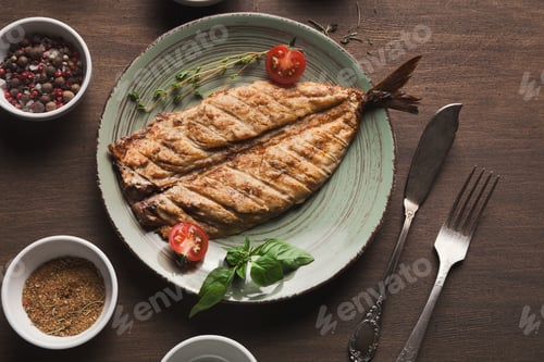 Preview: White fish juicy fillet grilled on barbecue