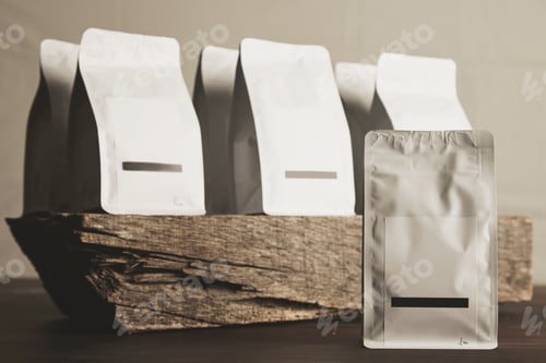 Preview: Blank sealed white packages with product inside ready for sale