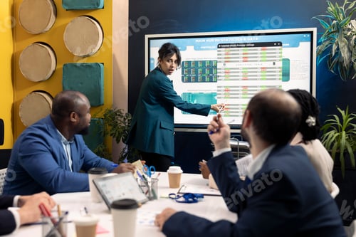 Preview: Corporate workmates looking into project insight and details