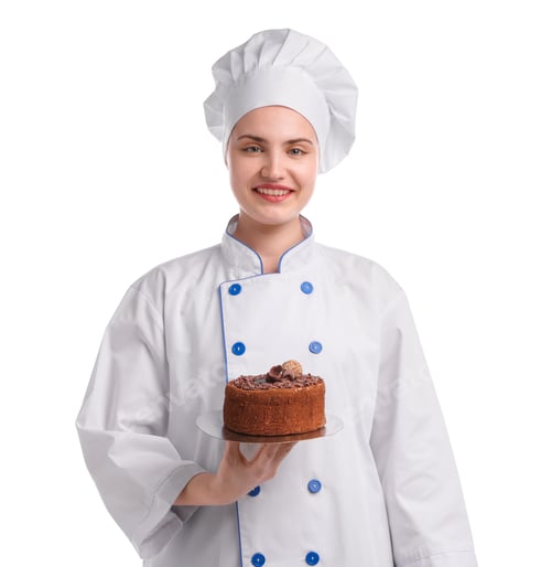 Preview: Happy confectioner in uniform holding delicious chocolate cake on white background
