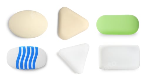 Preview: Many different erasers isolated on white, set. Top view