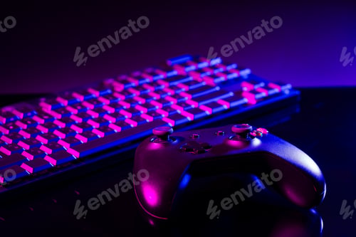 Preview: Computer keyboard, mouse and joystick on black background