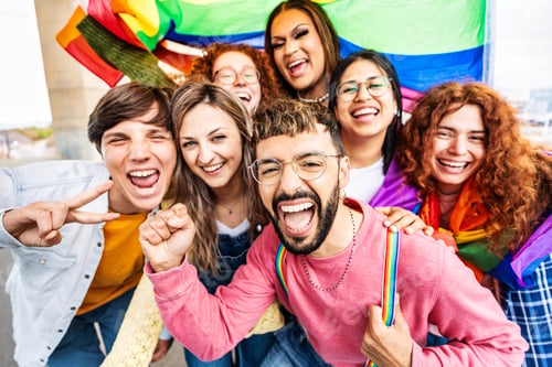 Preview: Diverse group of cheerful young people celebrating gay pride day