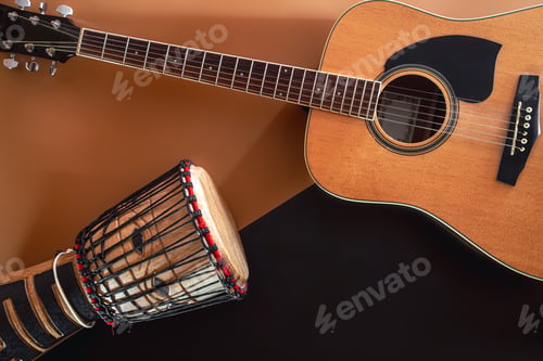 Preview: Flat lay, music background with acoustic guitar and drum.