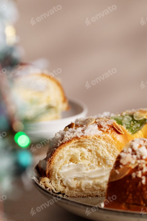 Preview: Spanish Three kings cake on decorated table with Christmas tree, celebration of Three Kings Day