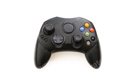 Preview: Video game controller isolated on white background. Gaming console control, black color, wireless