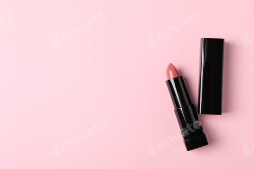 Preview: Lipstick on pink background, space for text. Female accessories