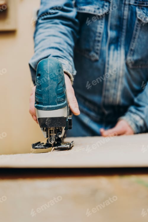 Preview: jig saw sawing wood panel