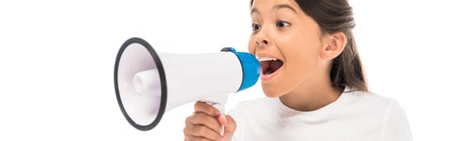 Preview: panoramic shot of cute kid screaming in megaphone isolated on white