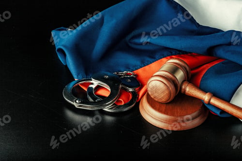 Preview: Russian justice. Wooden gavel and russian flag