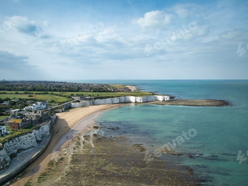 Preview: Scenic view of the sea featuring coastal houses in summer