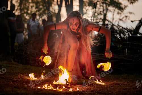 Preview: Girl fire dancing performance at outdoor art festival, smooth movements of female artist