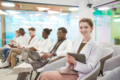 Preview: Group of Young Doctors at Seminar