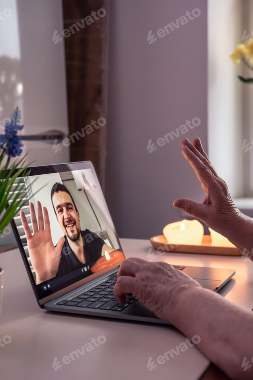 Preview: An old woman communicates with her son via video link through a laptop.