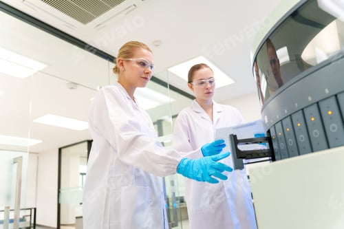 Preview: Scientists operate advanced laboratory equipment in a modern research facility