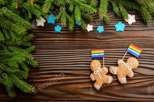 Preview: Christmas background of gingerbread man with flag spruce branches