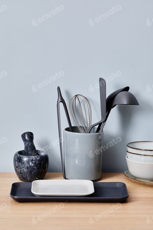 Preview: Kitchenware with other utensils on table