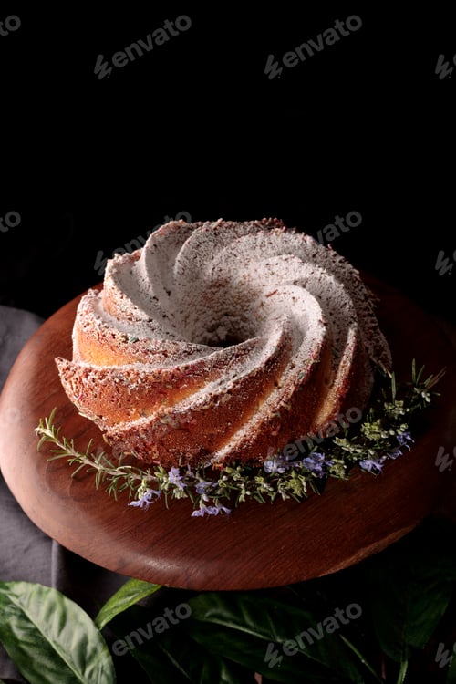 Preview: Bundt Cake with Powdered Sugar and Herb Decoration