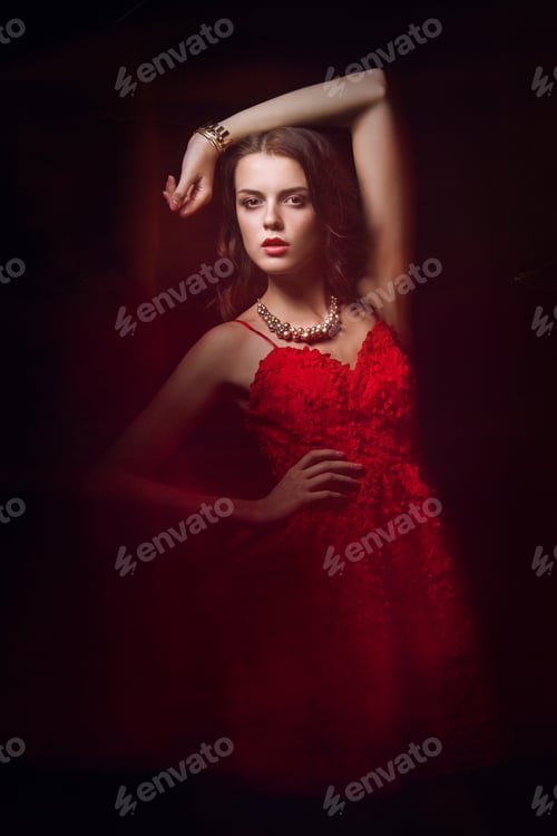 Preview: Blurred color art portrait of a girl on a dark background. Fashion woman with beautiful makeup and a