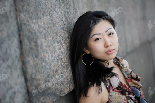 Preview: Portrait Of Asian Woman Near The Wall