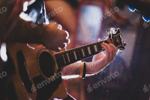 Preview: Playing classic guitar. Selective focus.