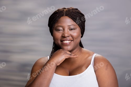 Preview: Portrait of african american person with natural glowing skin and candid smile