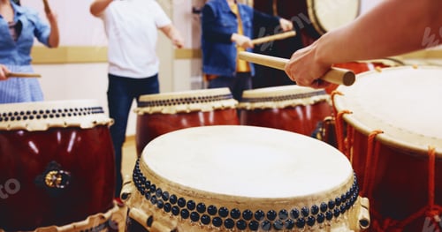 Preview: Japanese drums, hands and people with sticks on instrument for stage practice, performance or talen